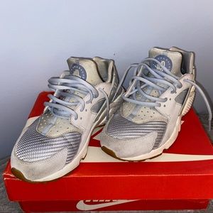 Grey and blue Nike huarache sneakers